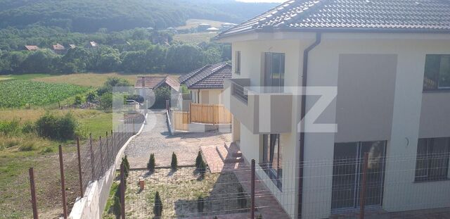 Casa individuala de vanzare in Popesti, 110 mp utili / 650 mp teren/15 mp front 