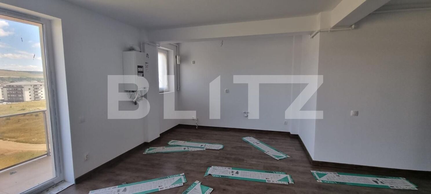 Apartament finisat 2 camere, 52.23 mp,incalzire in pardoseala, zona Terra! - PropertyBook